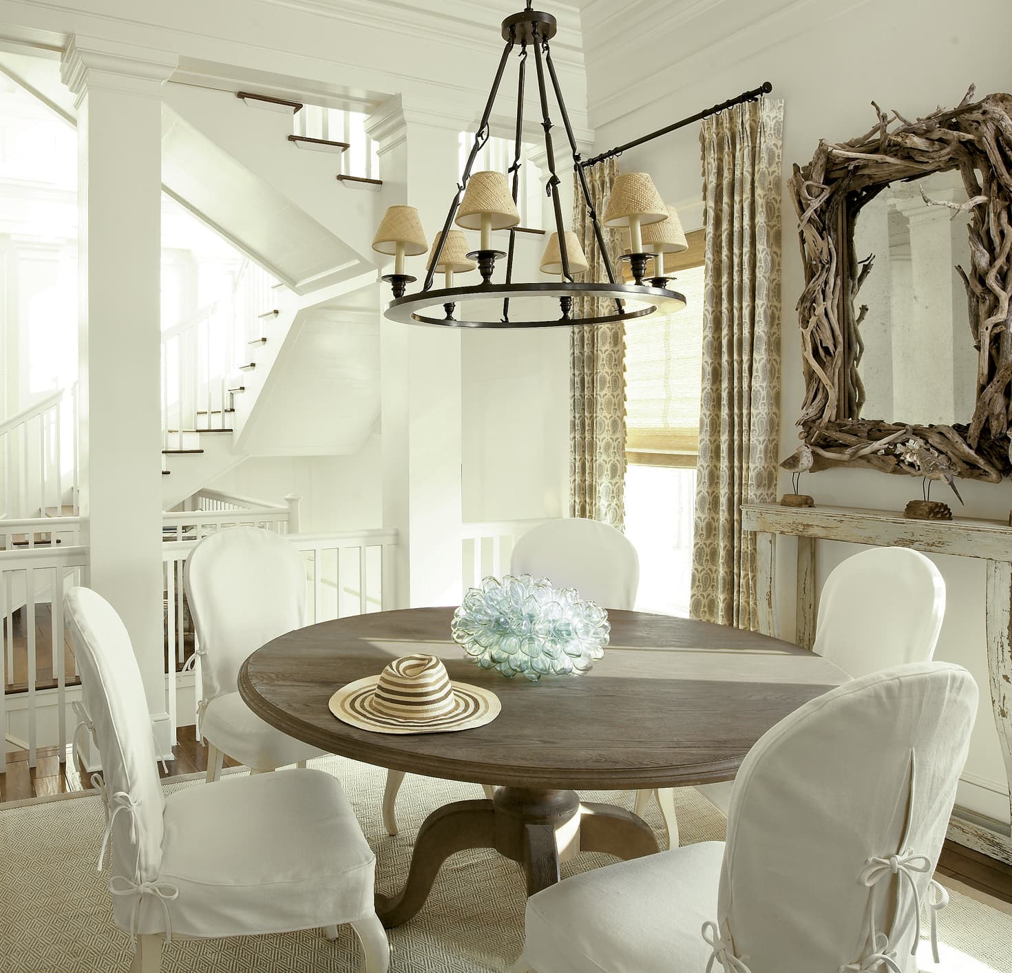 Dining area with table and chandelier