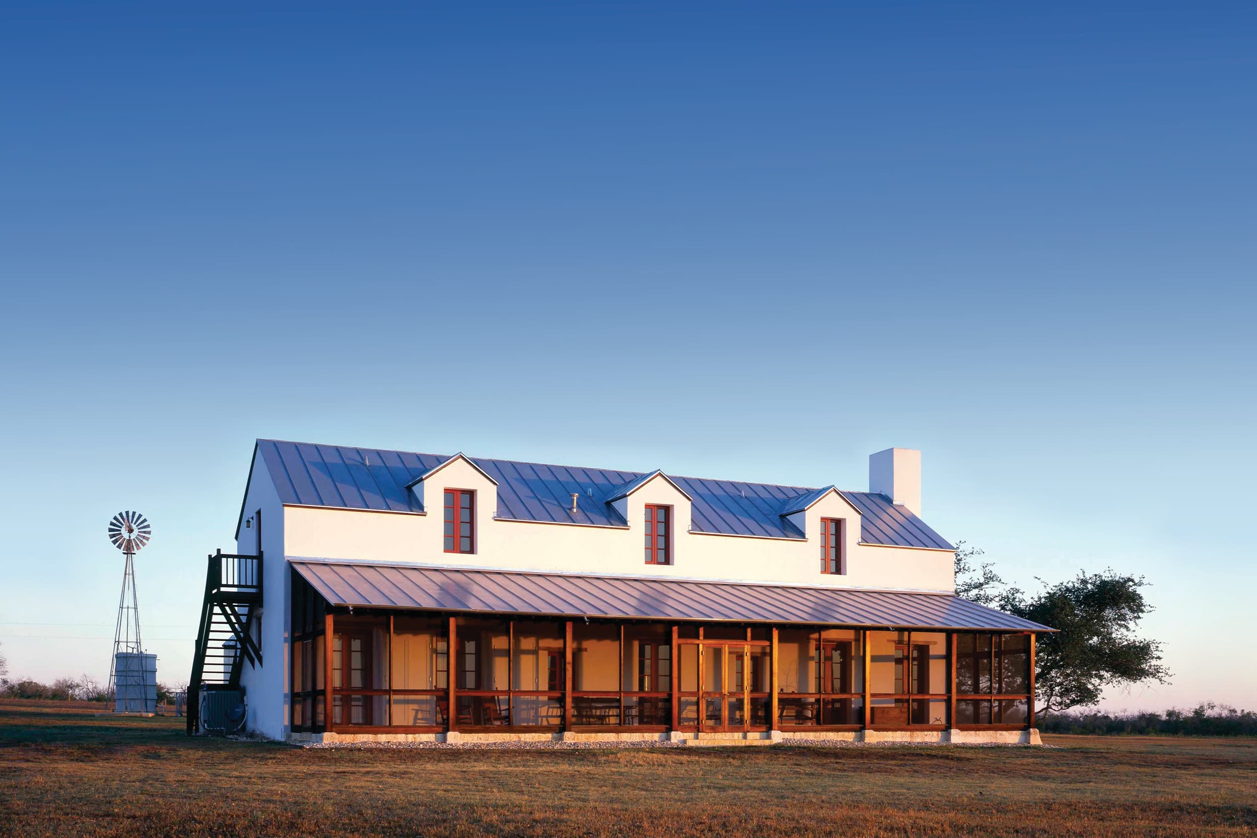 Farmhouse with a wide front porch