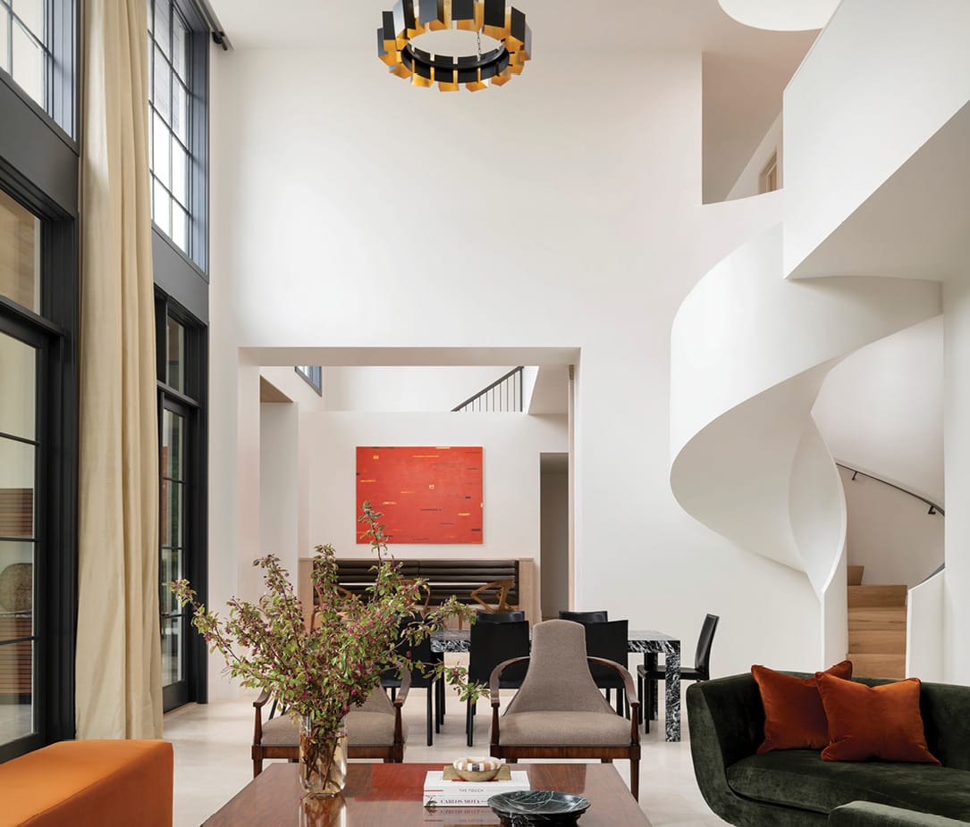 Modern white living room with spiral stairs